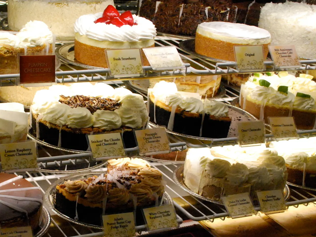 In this image, we can see there are cakes and cards arranged on the shelves.