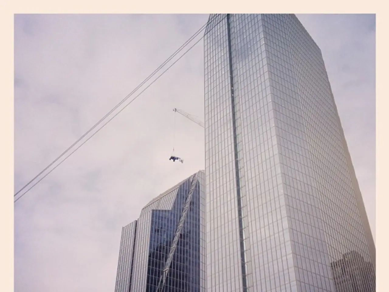 In this image in front there is a concrete fence. In the background of the image there are...