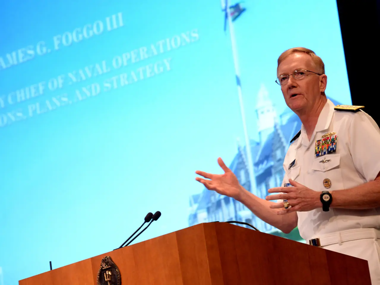 This image consists of a podium at the bottom. There is a person on the right side. There is a...