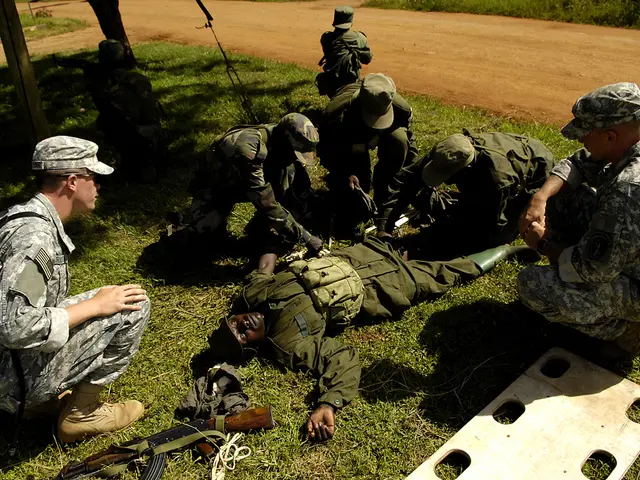 This image consists of few persons. They are wearing the army dresses. At the bottom, there is...