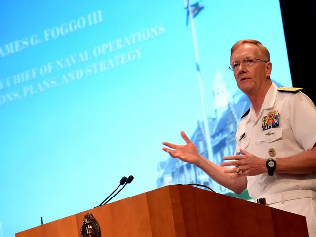 This image consists of a podium at the bottom. There is a person on the right side. There is a...