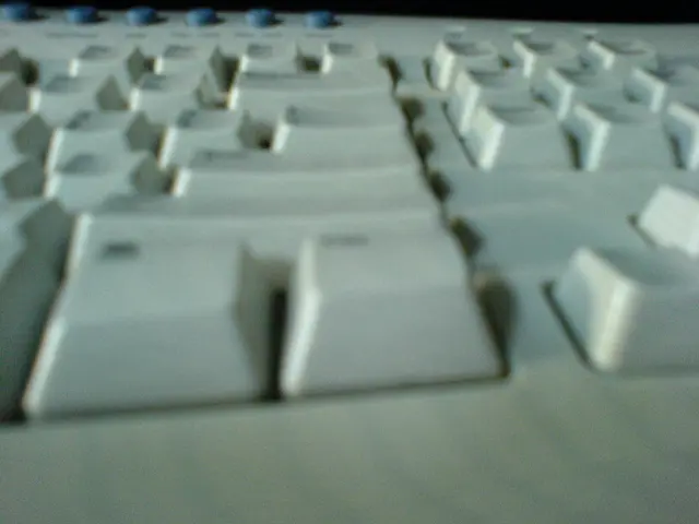 This is a keyboard which is white in color and also has some buttons which are white in color and...